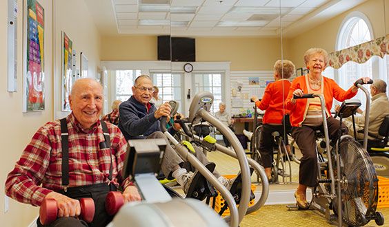 A group of seniors enjoying a fitness session at a community center.
