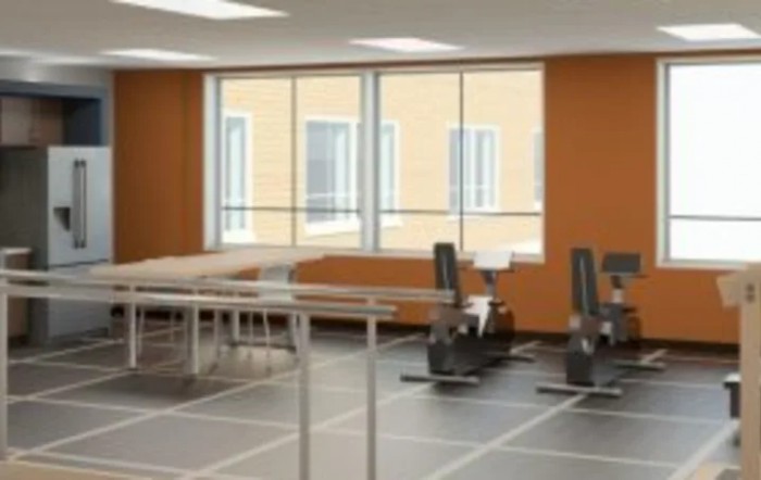 An indoor workout space with fitness equipment and exercise machines.