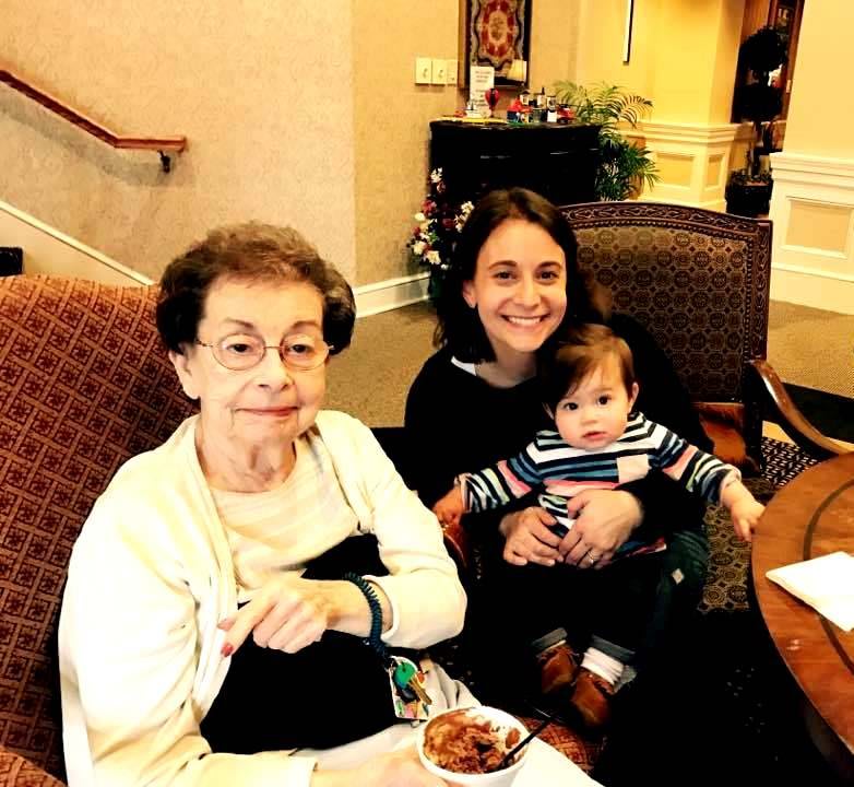 A heartwarming moment with three generations together.
