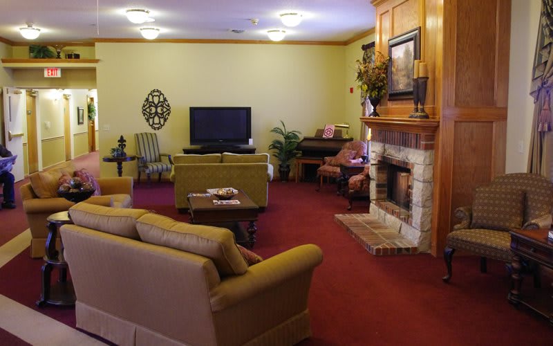 Cozy living room with a fireplace and comfortable seating.