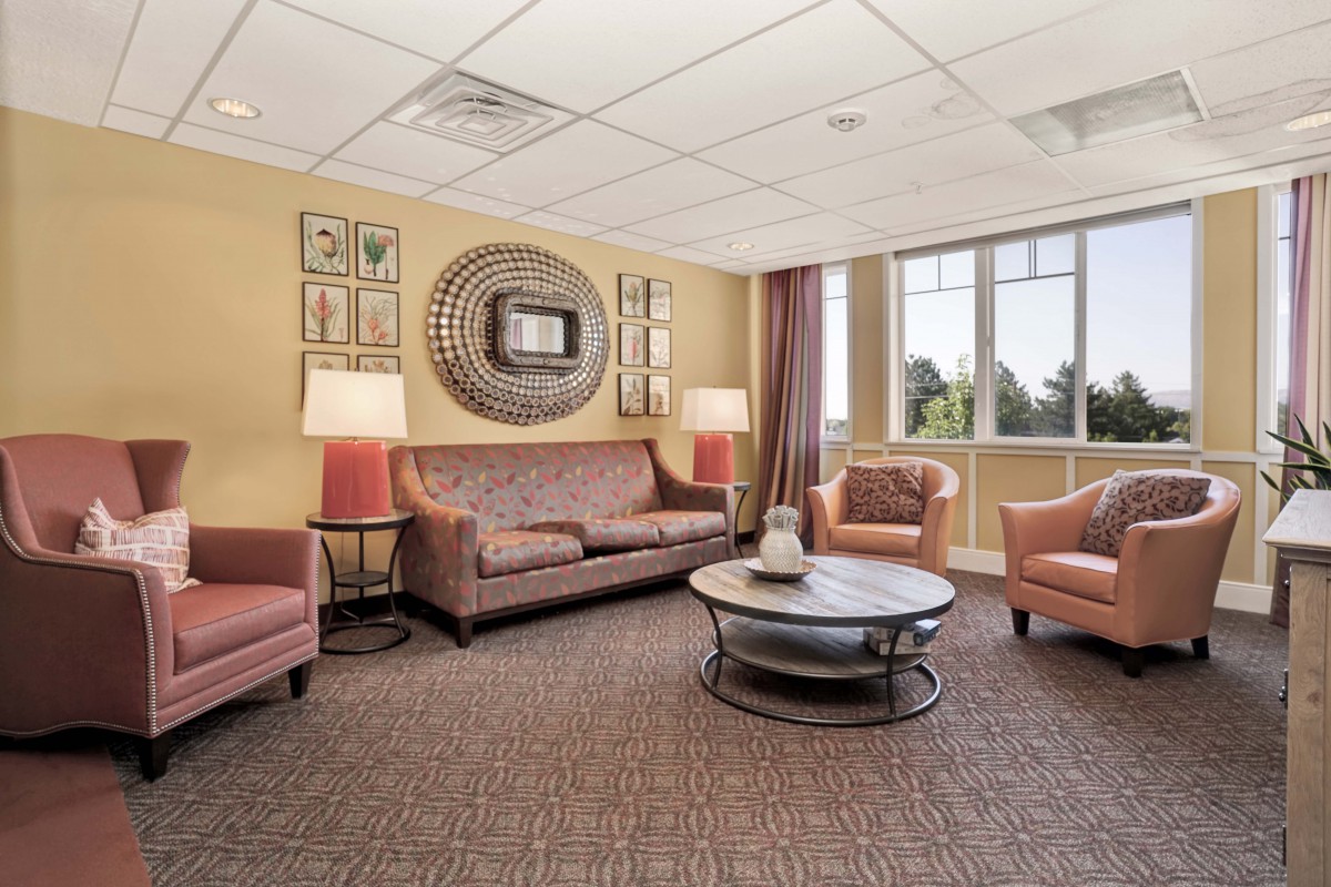 A cozy living room with comfortable seating and stylish decor.
