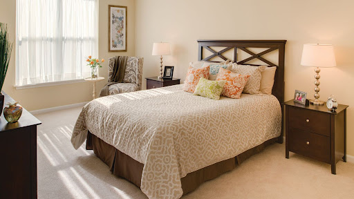 A beautifully designed bedroom featuring a cozy bed, stylish furniture, and soft natural light.