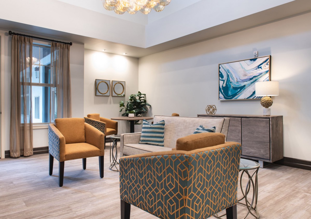 A modern living room with comfortable seating and stylish decor.