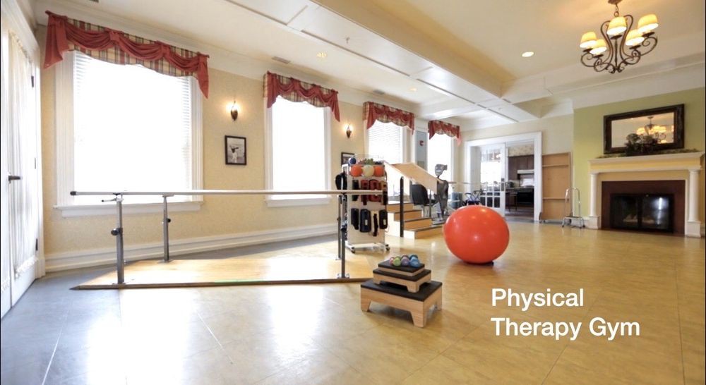 A well-equipped physical therapy room with various exercise tools.