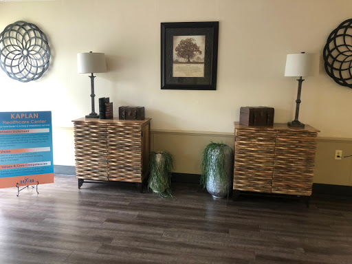 A cozy living room setup featuring decorative furniture and ambient lighting.