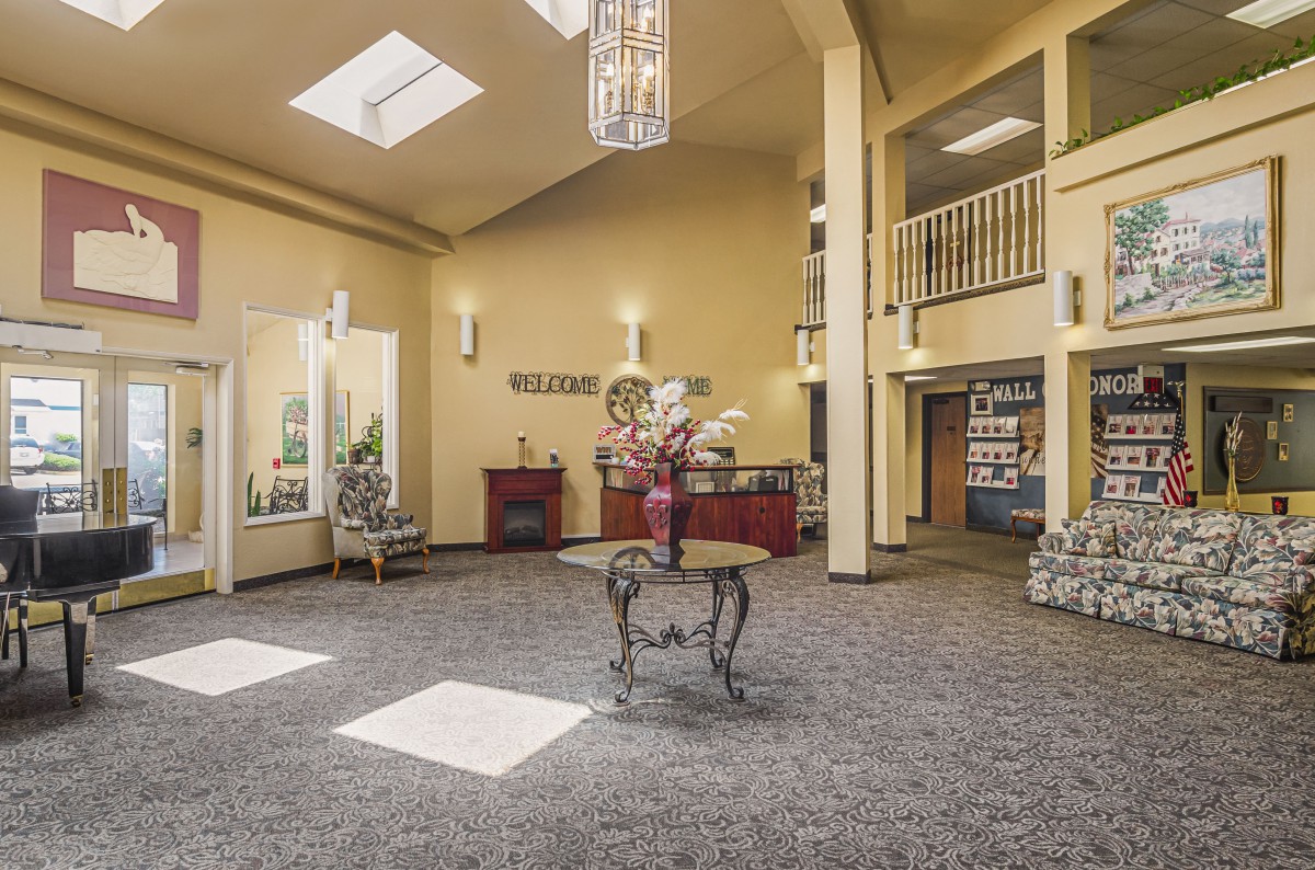 A welcoming lobby with elegant chandeliers and a spacious reception area.