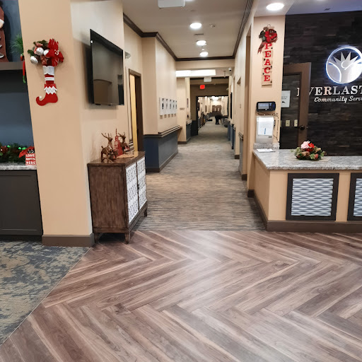 A modern lobby area with a well-designed floor and festive decorations.