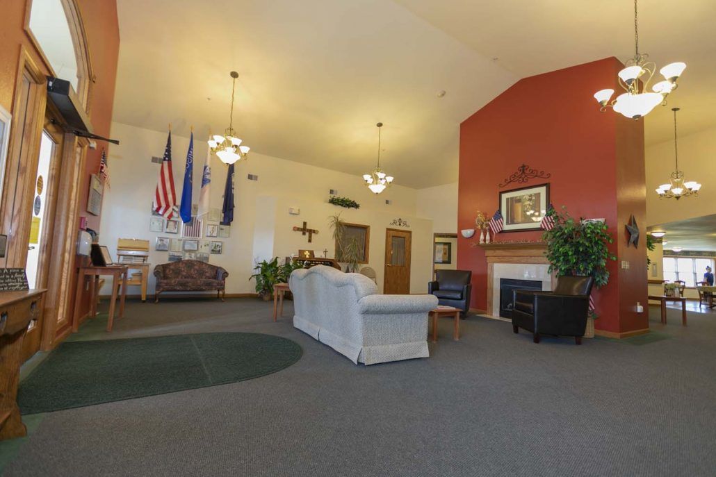A spacious lobby area with comfortable seating and decorative elements.