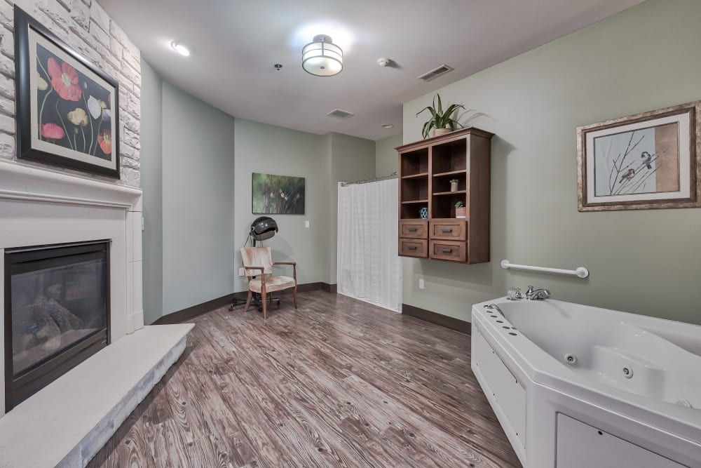Spacious modern bathroom with a bathtub and minimalist design.