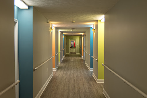 A brightly colored hallway showcasing a blend of hues and modern design.