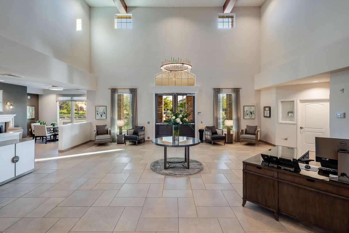 A modern and spacious lobby with elegant furniture and stylish decor.