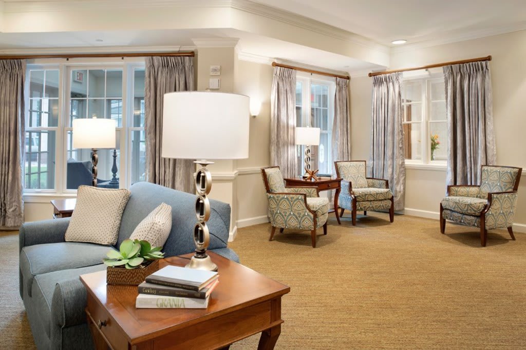A cozy living room featuring elegant furniture and soft lighting.