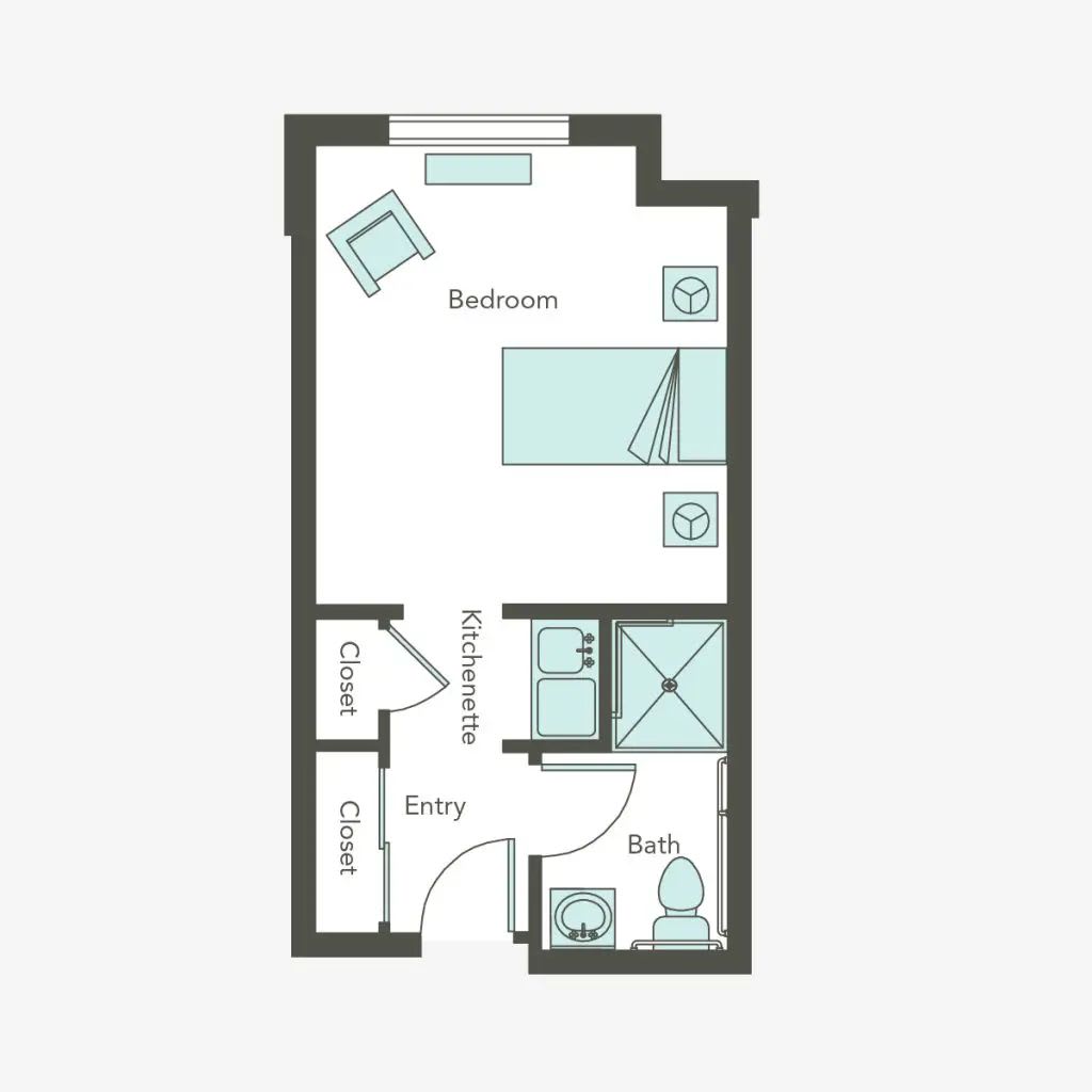 Floor plan of a studio apartment showing the arrangement of a bed, kitchenette, and bathroom.