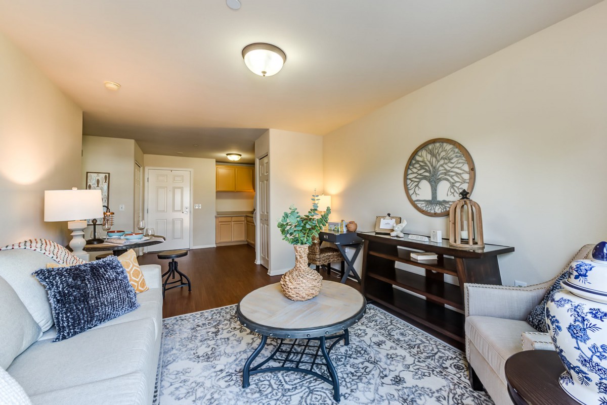 A bright and cozy living room with modern furniture and decor.