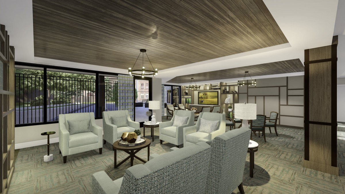 A modern living room featuring elegant furniture and a stylish chandelier.