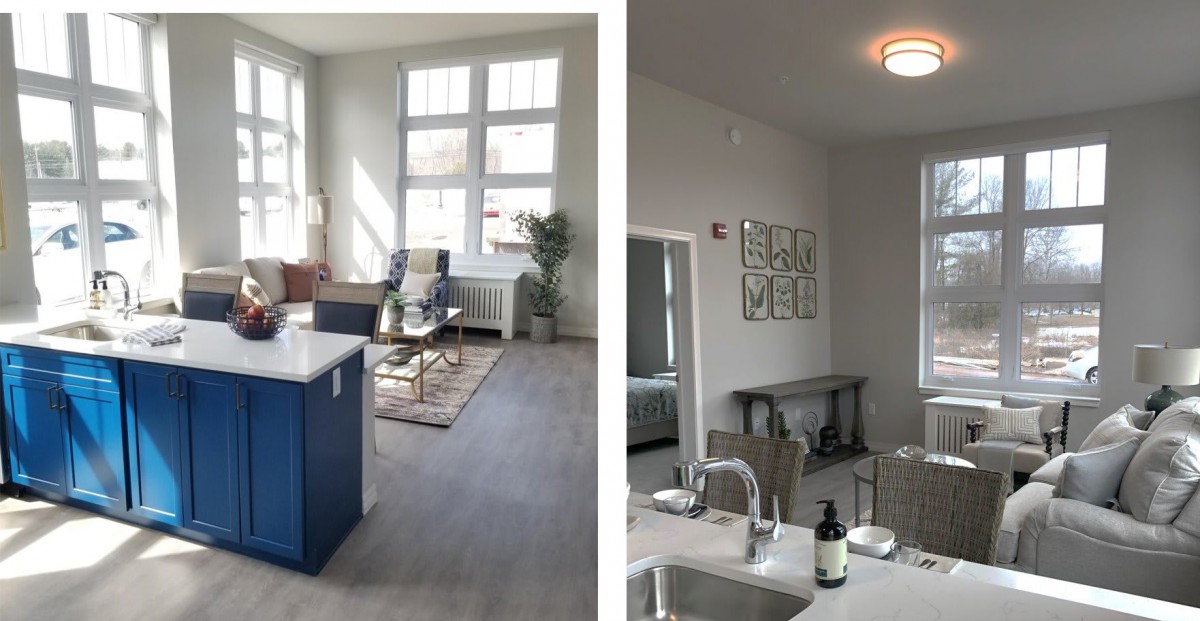 A modern apartment interior featuring a bright kitchen and living area with stylish decor.