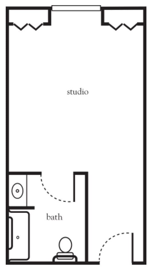 A simple floor plan of a studio apartment with a small bathroom.