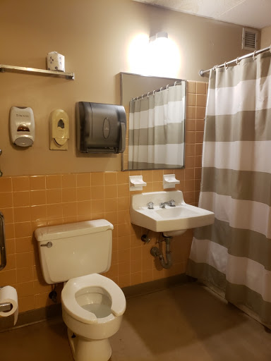 Clean and functional bathroom with essential amenities.