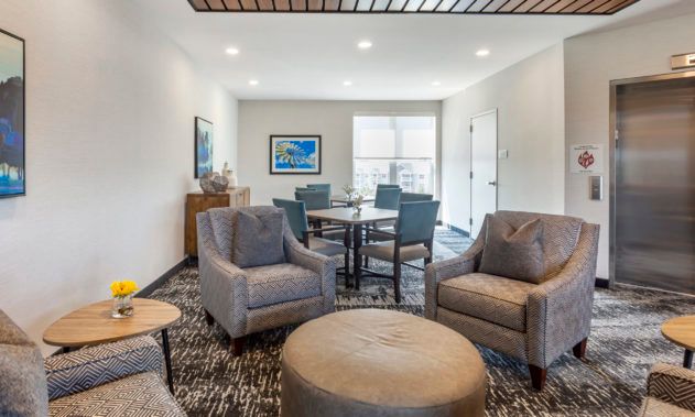 A stylish living room with comfortable seating and modern decor.