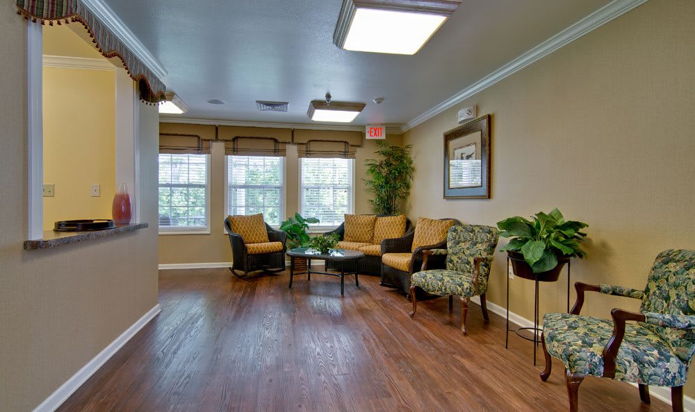 A cozy living room with comfortable seating and natural light.