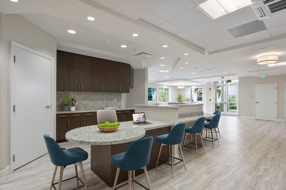 Modern kitchen with a spacious dining area and contemporary design.