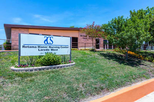 Exterior view of a nursing center with clear signage and well-maintained landscaping.
