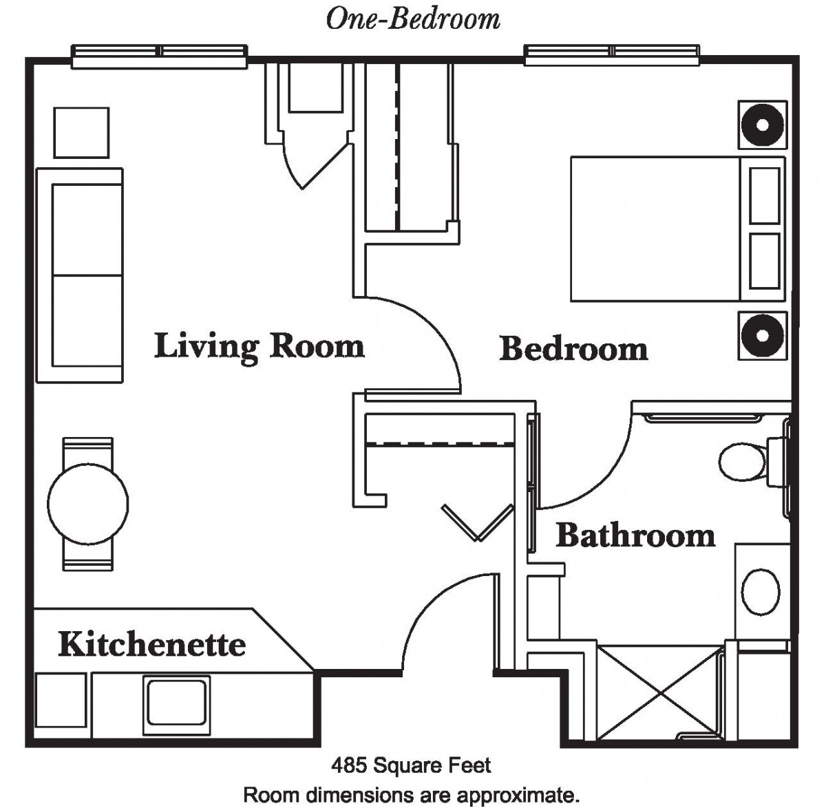 A floor plan of a one-bedroom apartment with living room, bedroom, bathroom, and kitchenette.