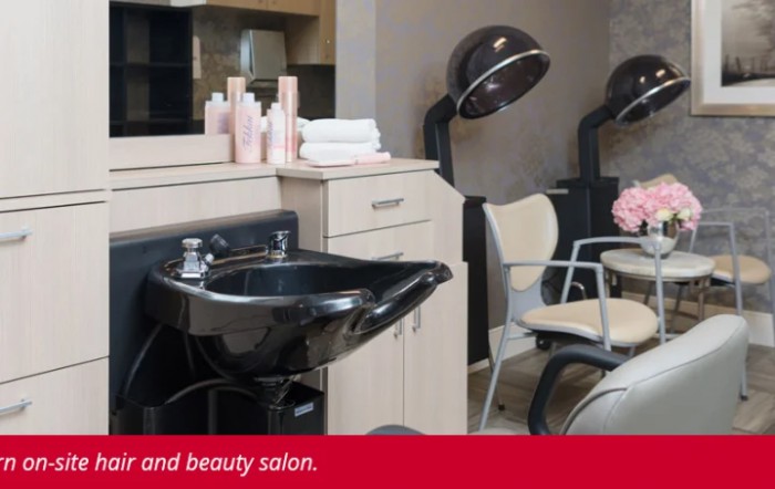 Interior of a modern beauty and hair salon with equipment and chairs.