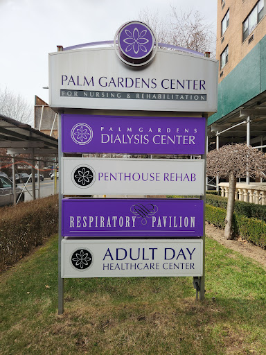 Signage for various health and rehabilitation services at Palm Gardens Center.