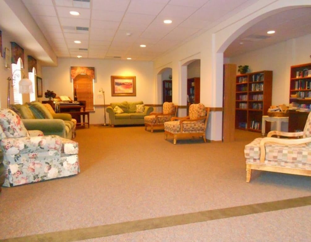 A spacious living room with comfortable seating and elegant decor.