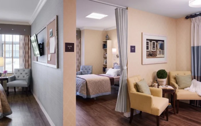 Comfortable and elegantly decorated bedroom, featuring a cozy bed and seating area with soft lighting.