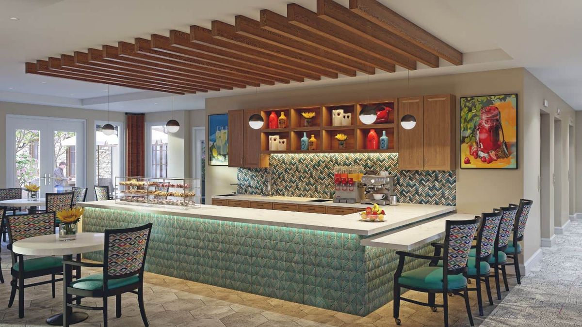 A modern kitchen with decorative tile backsplash, wooden shelves, and a central island.