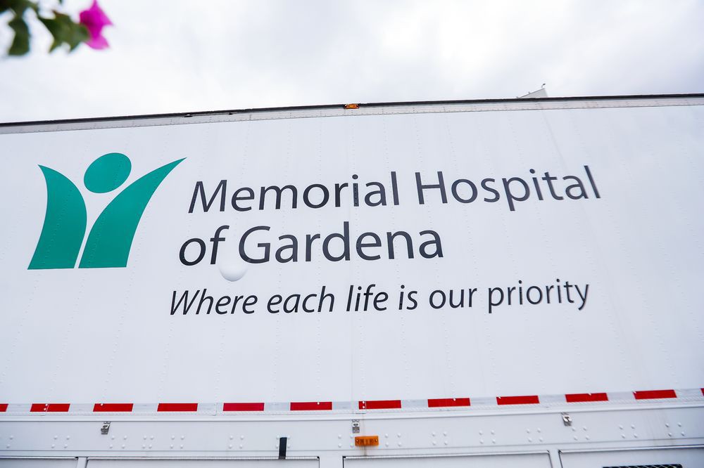 Sign for Memorial Hospital of Gardena with the tagline 'Where each life is our priority.'