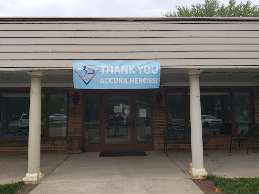 A building entrance featuring a banner that expresses gratitude to heroes.