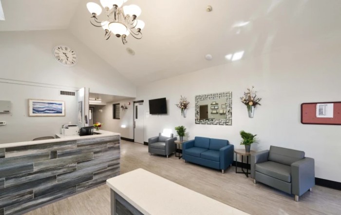 A modern and stylish reception area with comfortable seating and elegant lighting.