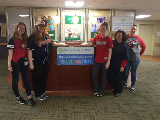 Team members celebrating together at a community event.