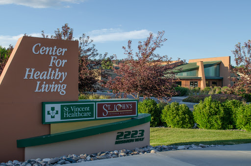 The Center for Healthy Living signage at a healthcare facility showcasing various services.