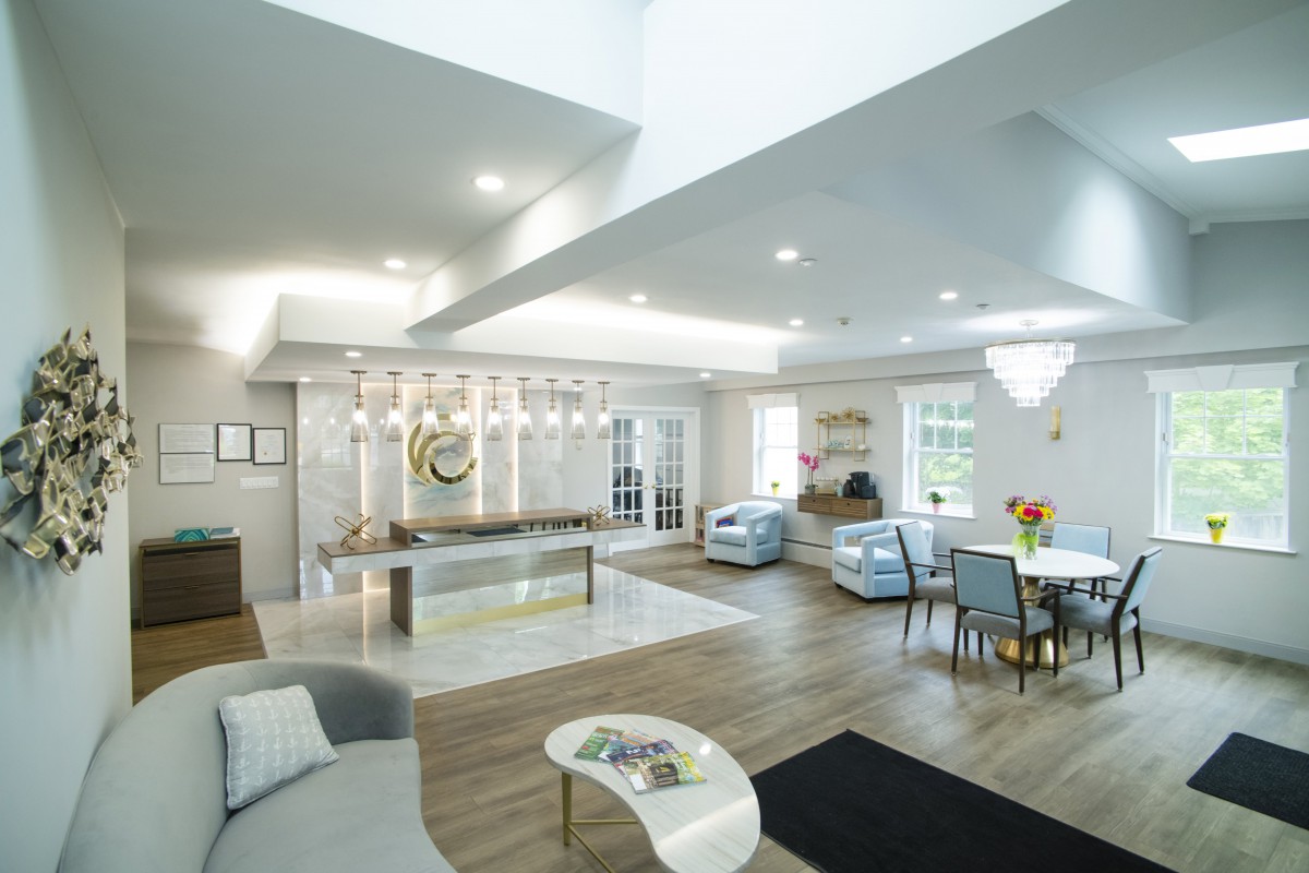 A modern lobby with stylish furniture and bright lighting.