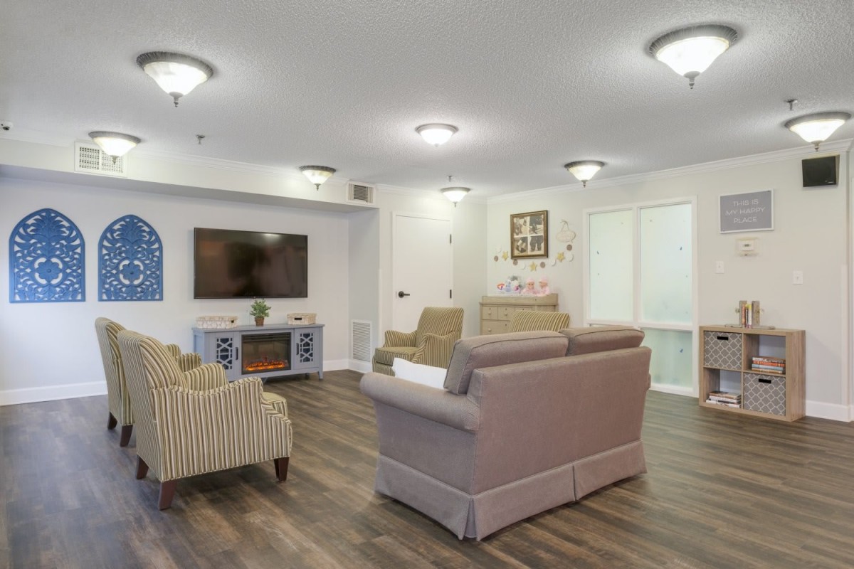 A cozy living room with comfortable seating and modern decor.