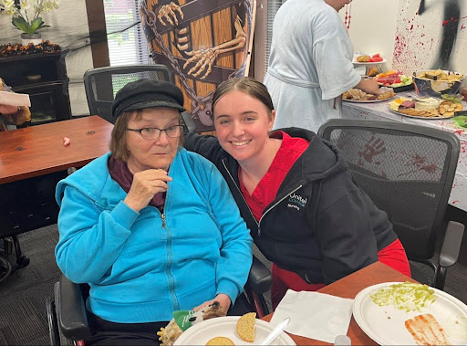 Enjoying a meal together and sharing smiles.