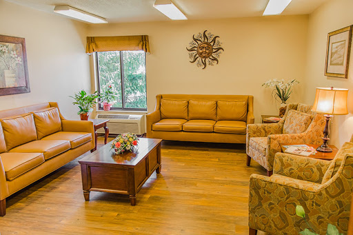 A cozy and inviting living room setup with comfortable seating and natural elements.