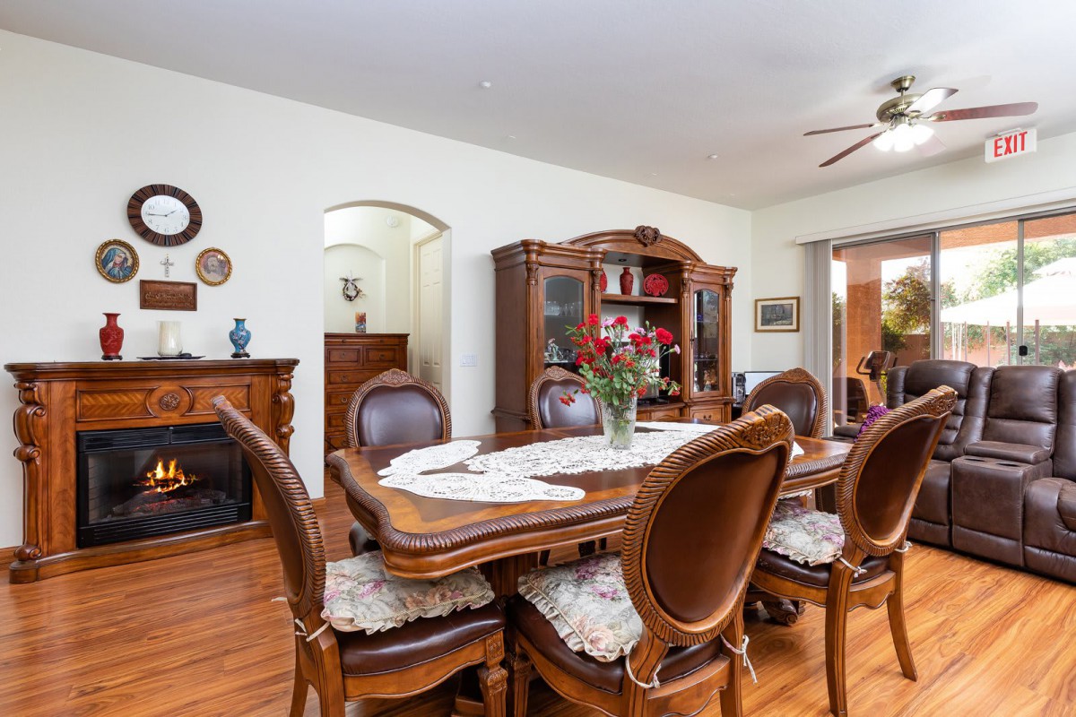 A classic dining room with elegant wooden furniture and decorative accents.