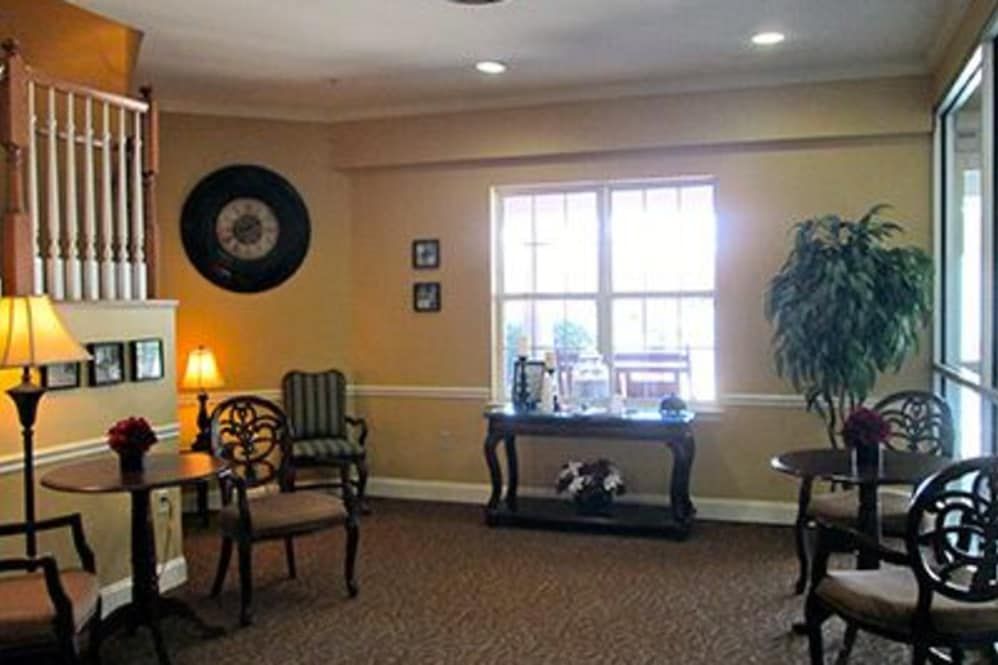 A cozy living room with elegant furniture and soft lighting.