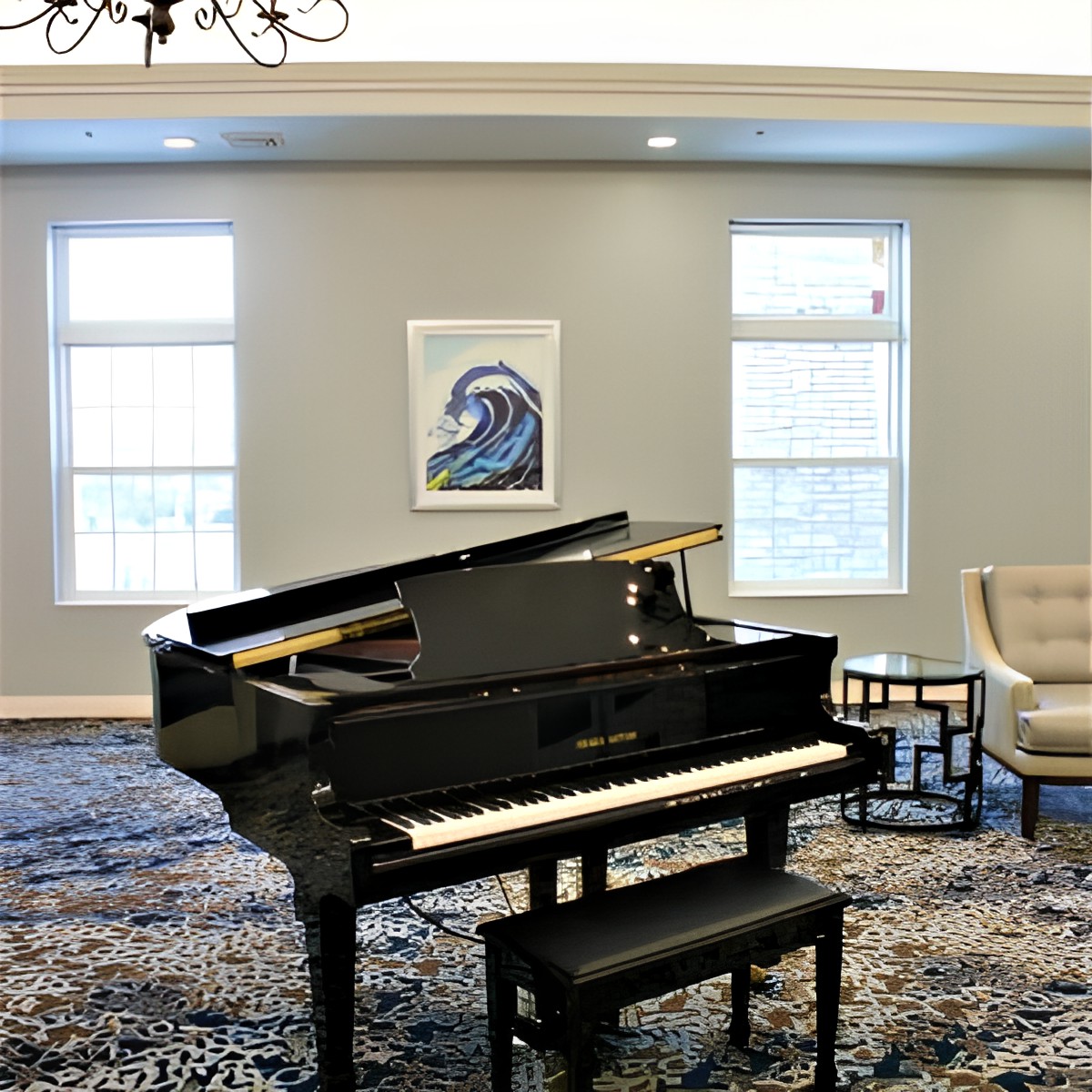 A cozy living room with a grand piano and modern decor.