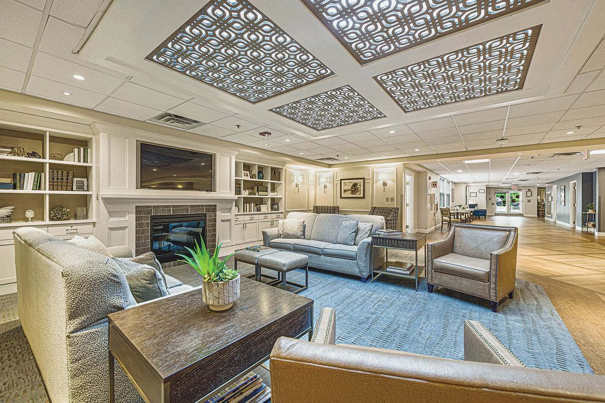 A modern lounge area featuring comfortable seating and elegant decor.