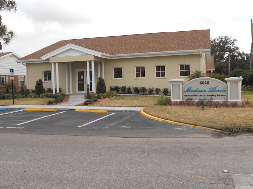 A medical office building with a welcoming entrance and well-maintained landscaping.