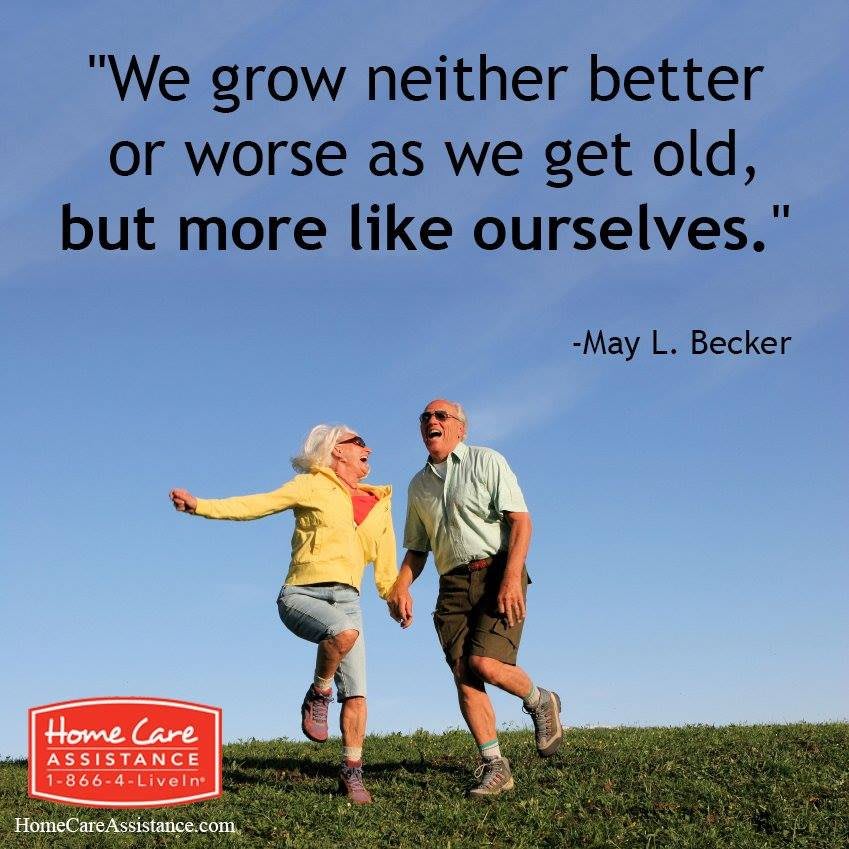 An elderly couple joyfully walks outdoors with a quote about aging and self-acceptance.