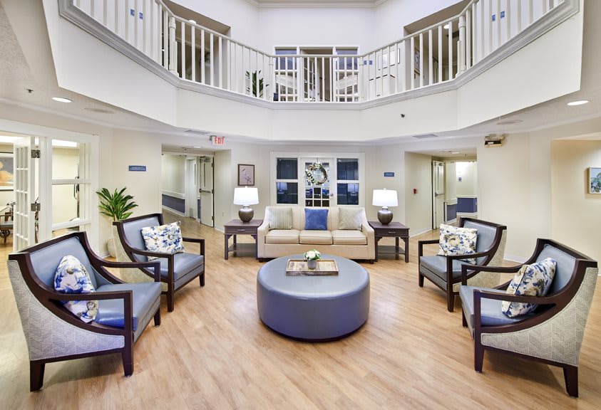 A spacious and modern lobby with comfortable seating and elegant decor.