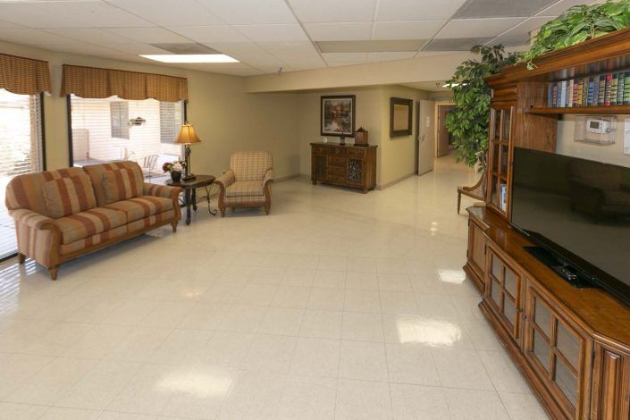 A spacious lobby area featuring comfortable seating and tasteful decor.