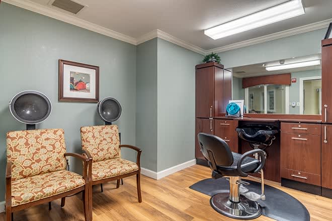 An inviting hair salon with a waiting area and styling stations.
